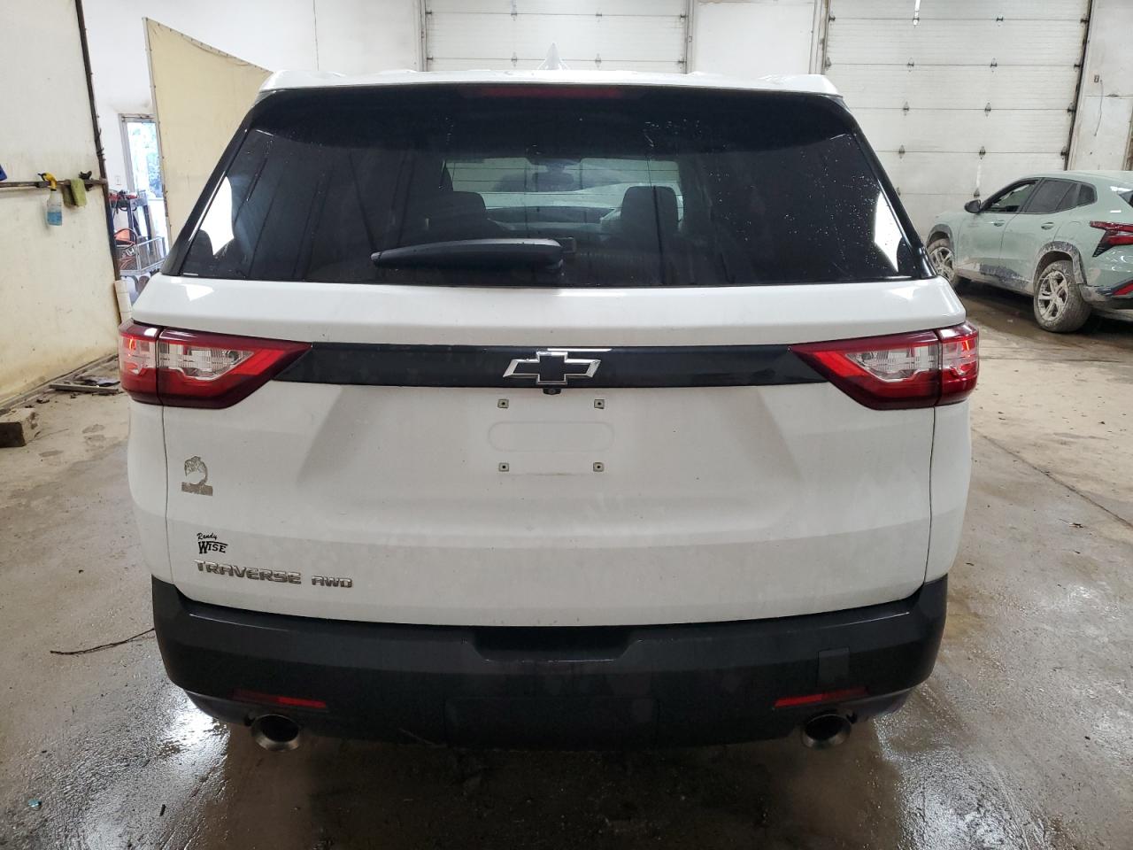 2020 Chevrolet Traverse VIN 1GNEVFKWXLJ315714 Copart auction photo, front end / minor dent/scratches damage thumbnail 6