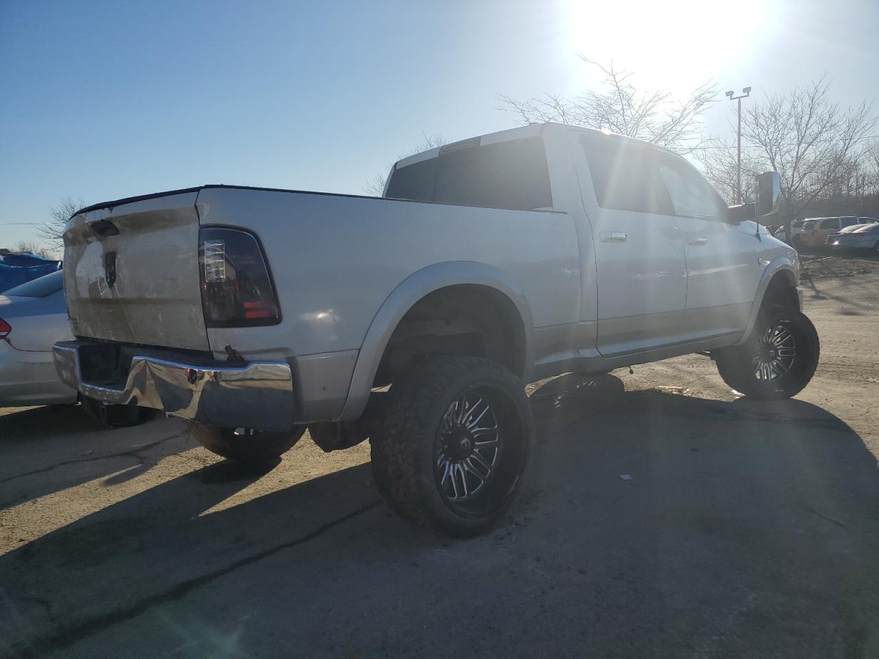 2012 Dodge RAM VIN 3C6UD5FL5CG104673 Copart auction photo, side / rear end damage thumbnail 3