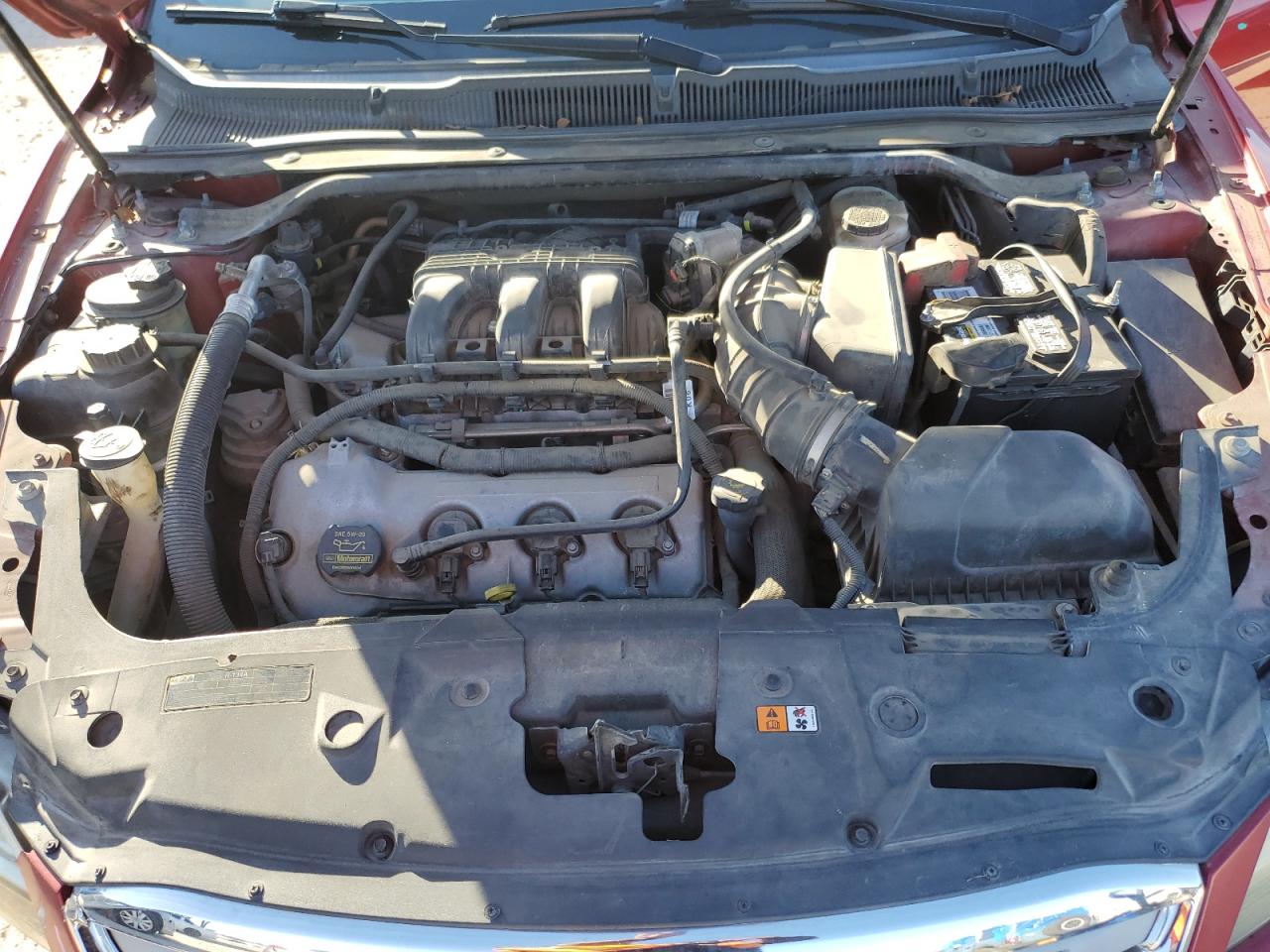 2010 Ford Taurus VIN 1FAHP2EW7AG106807 Copart auction photo, all over damage thumbnail 11