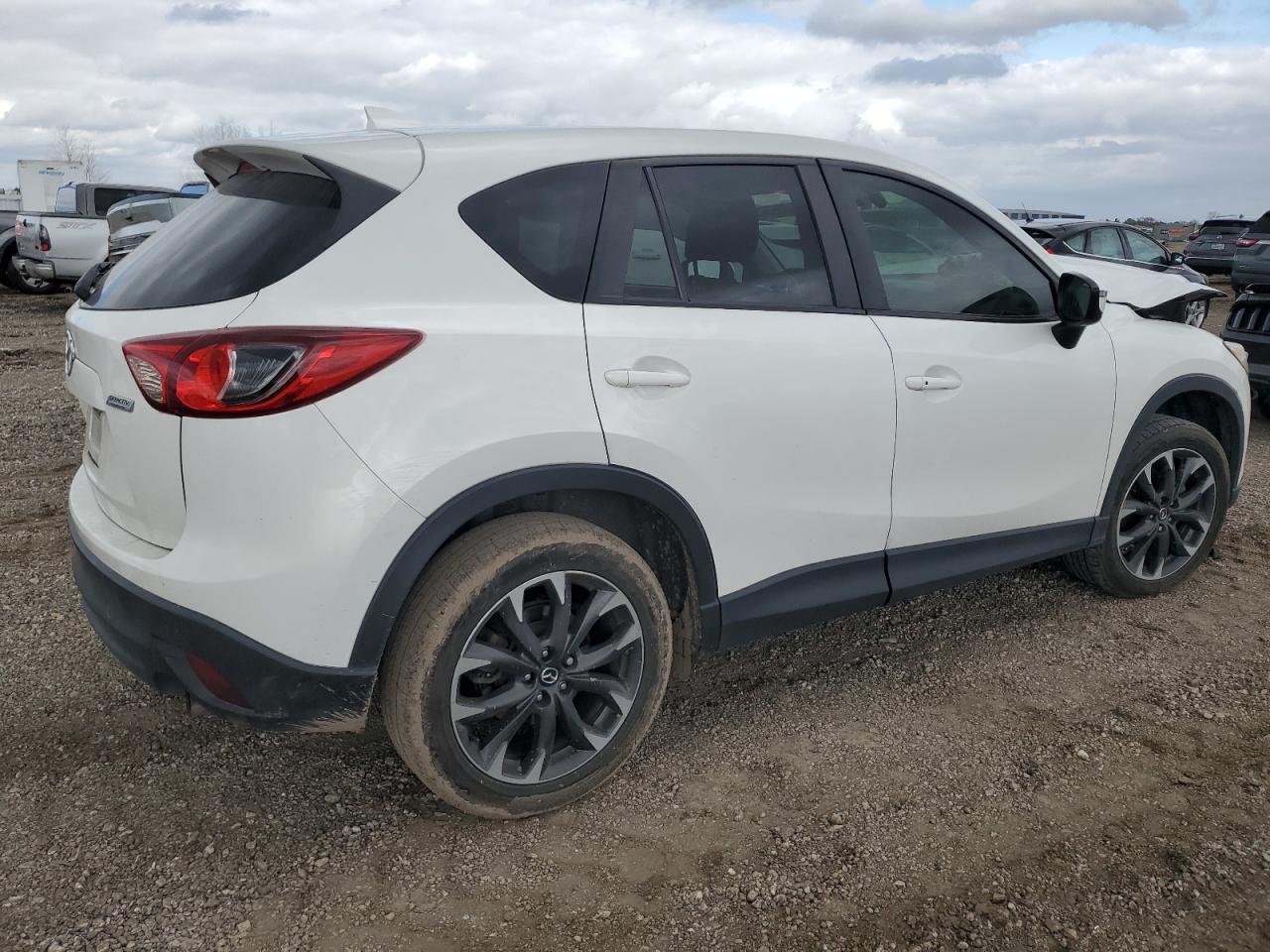 2016 Mazda CX-5 VIN JM3KE2DYXG0784971 Copart auction photo, front end / minor dent/scratches damage thumbnail 3