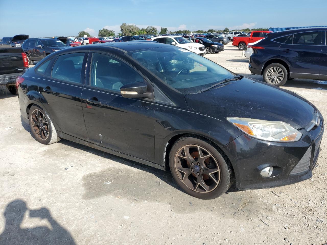 2013 Ford Focus VIN 1FADP3F23DL379870 Copart auction photo, water/flood damage thumbnail 4