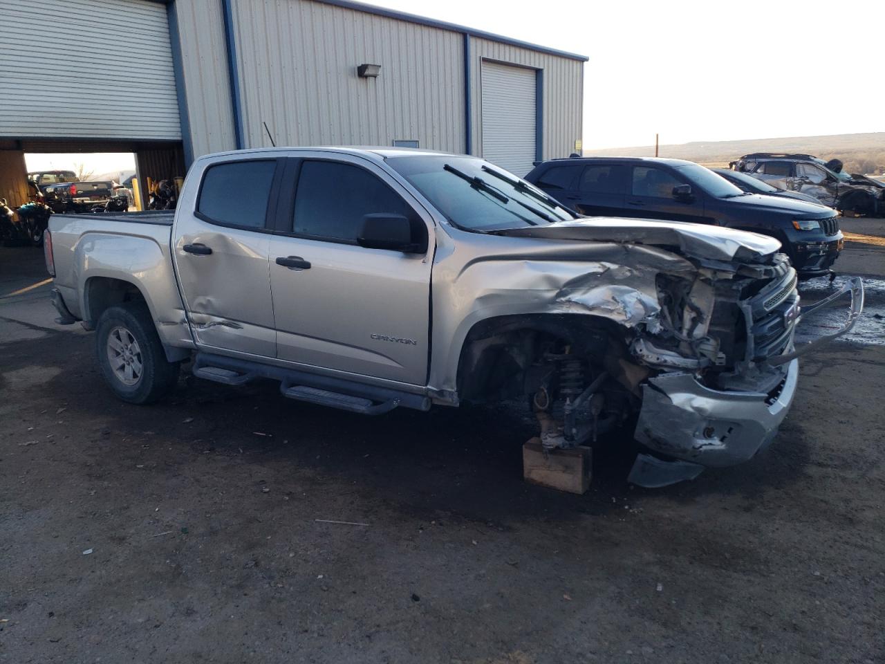 2016 GMC Canyon VIN 1GTG5BE36G1360215 Copart auction photo, front end / side damage thumbnail 4