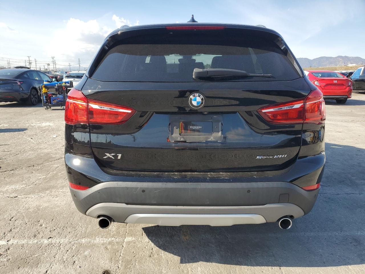 2019 BMW X1 VIN WBXHU7C59K5N01520 Copart auction photo, front end / minor dent/scratches damage thumbnail 6