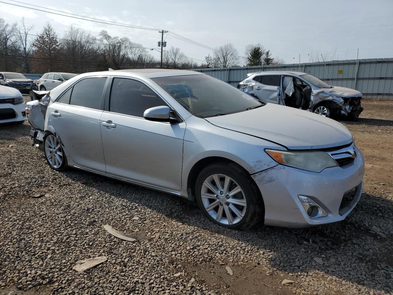 2012 Toyota Camry VIN 4T1BK1FK4CU508286 Copart auction photo, side / rear end damage thumbnail 4