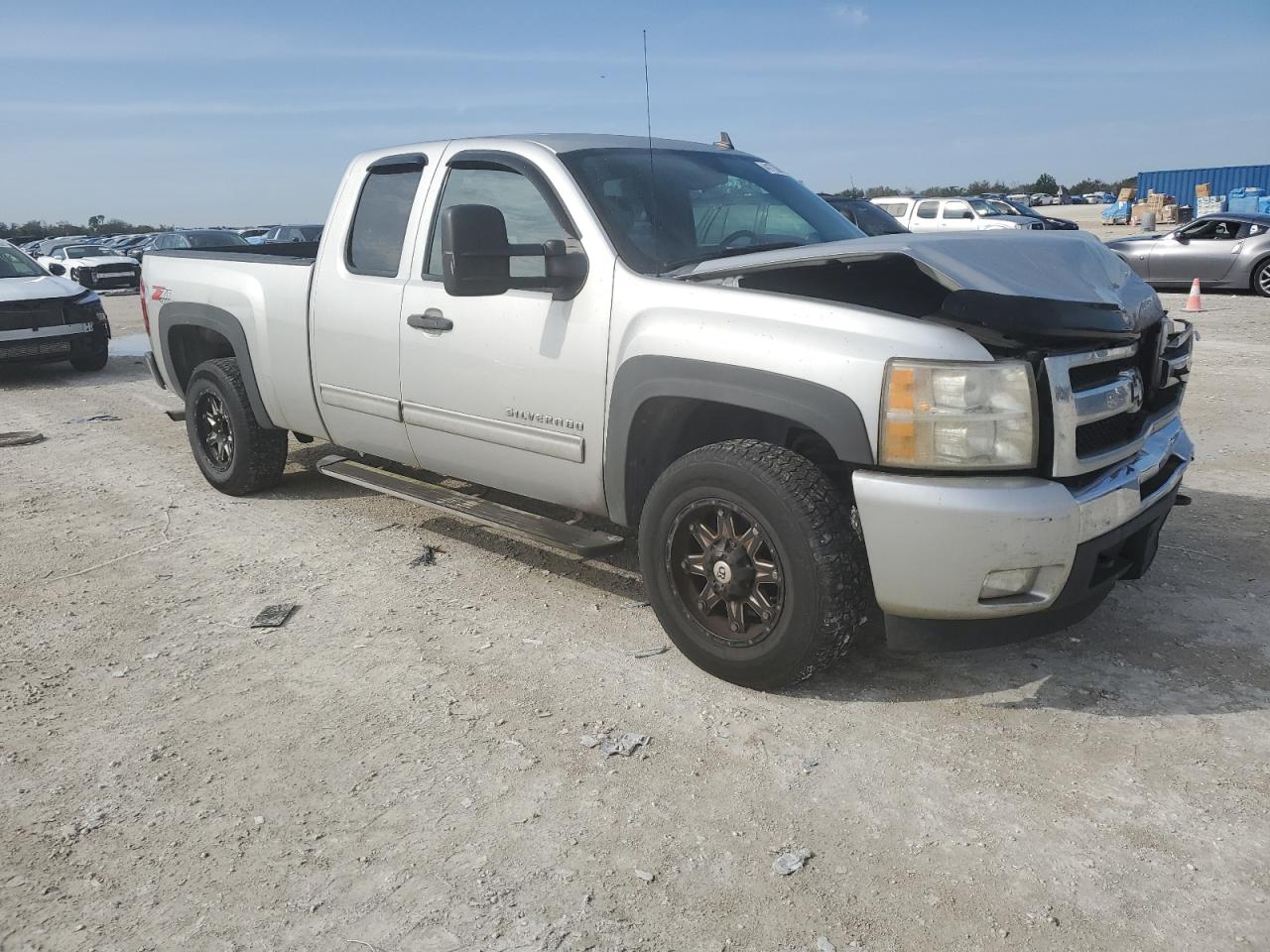 2011 Chevrolet Silverado VIN 1GCRKSE32BZ357436 Copart auction photo, front end / rear end damage thumbnail 4
