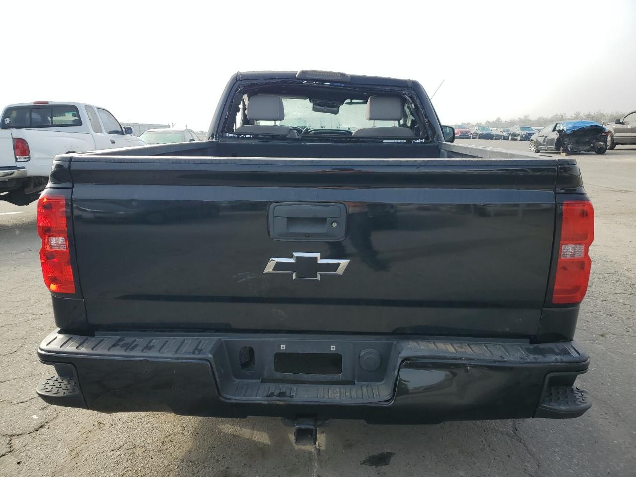 2018 Chevrolet Silverado VIN 1GCNCNEH8JZ144918 Copart auction photo, rollover damage thumbnail 10