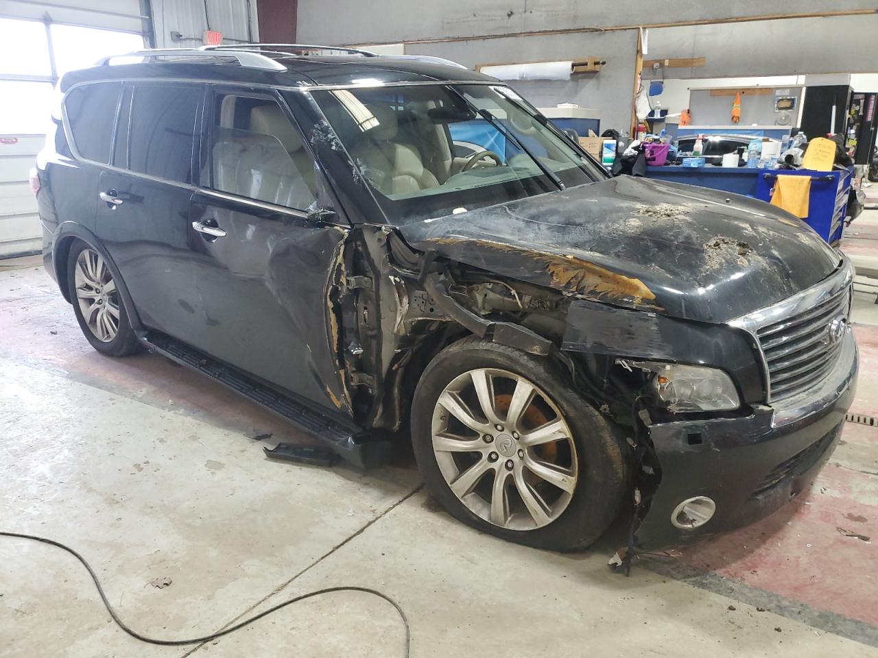 2011 Infiniti QX56 VIN JN8AZ2NC0B9300939 Copart auction photo, all over damage thumbnail 4