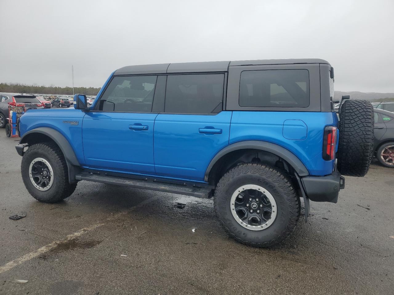 2023 Ford Bronco VIN 1FMEE5DP1PLB63885 Copart auction photo, undercarriage / front end damage thumbnail 2