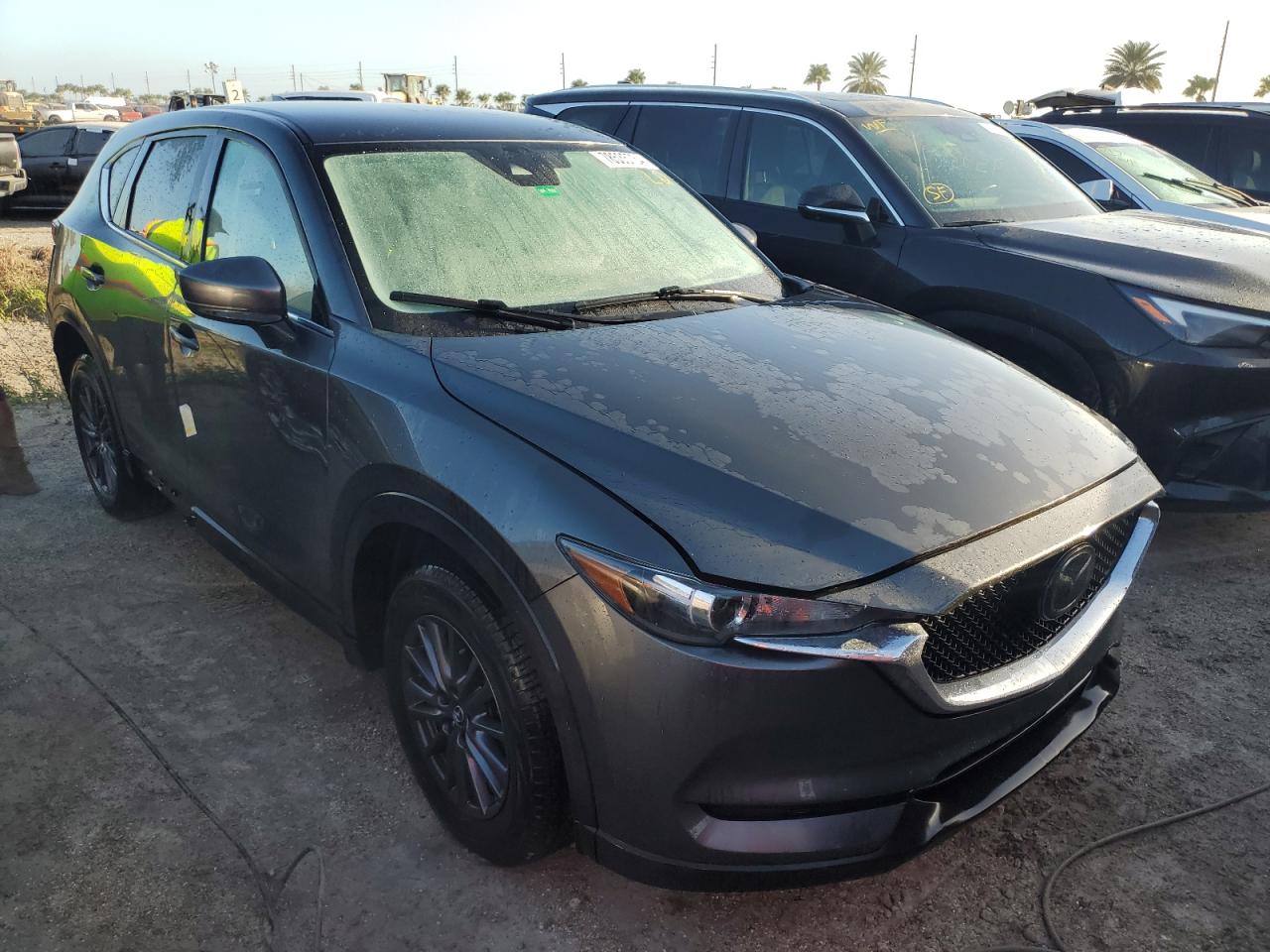 2021 Mazda CX-5 VIN JM3KFACM8M0450603 Copart auction photo, water/flood damage thumbnail 4