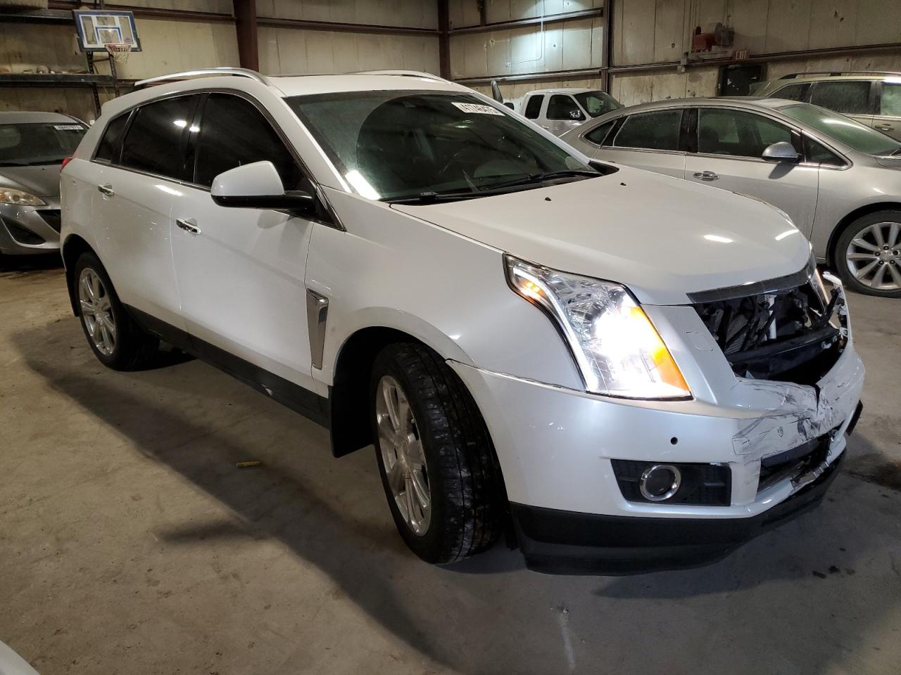 2013 Cadillac SRX VIN 3GYFNDE35DS533296 Copart auction photo, front end / minor dent/scratches damage thumbnail 4