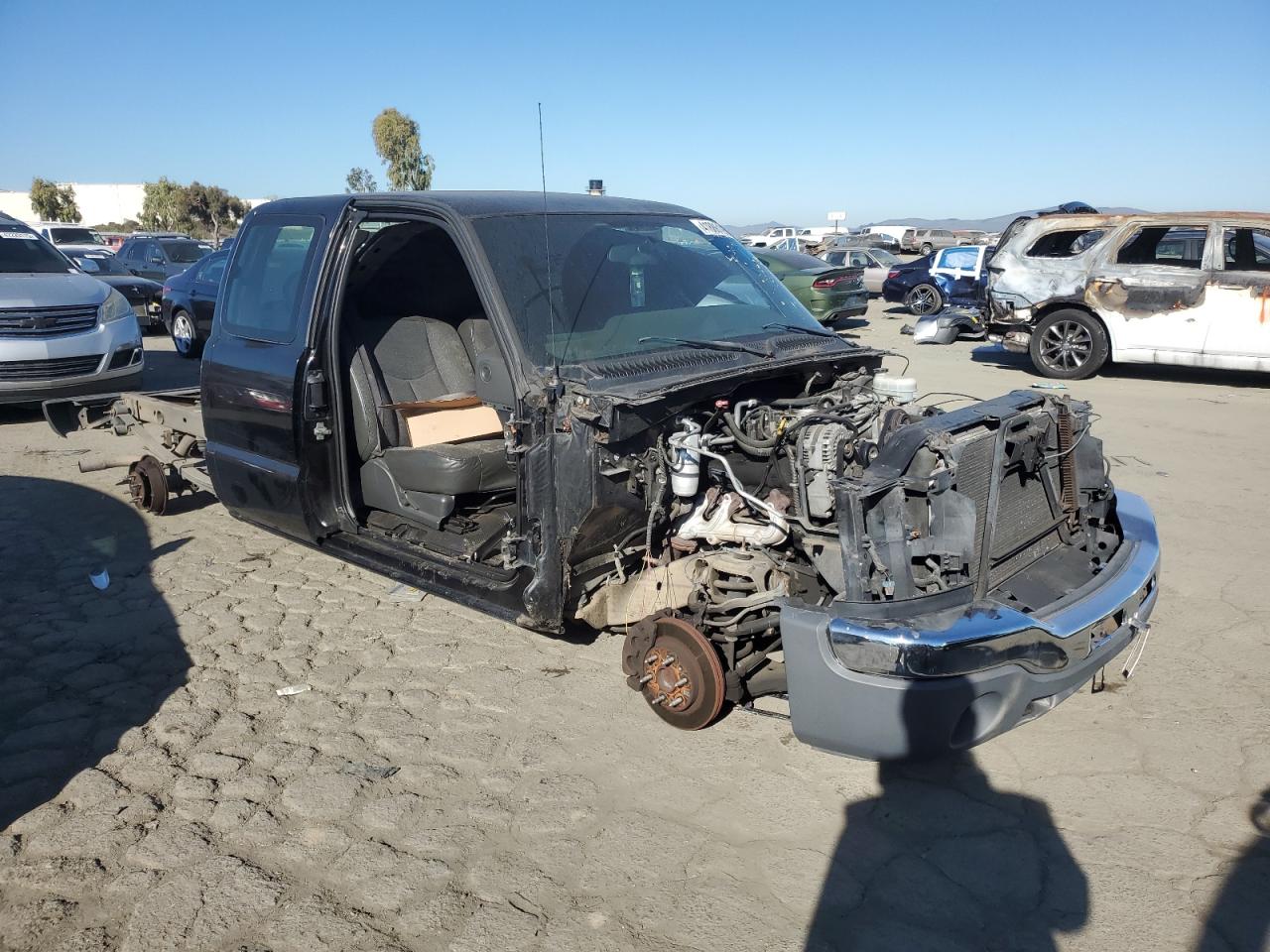 2006 GMC Sierra VIN 1GTEC19X36Z270900 Copart auction photo, vandalism / stripped damage thumbnail 4