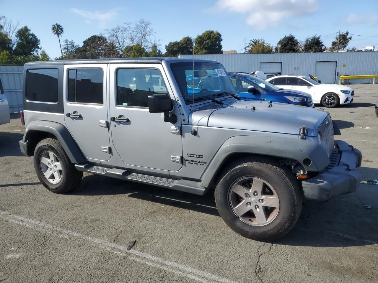2015 Jeep Wrangler VIN 1C4BJWDG9FL551339 Copart auction photo, minor dent/scratches damage thumbnail 4