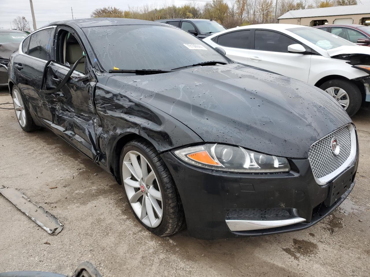 2015 Jaguar XF VIN SAJWA0F78F8U87018 Copart auction photo, side damage thumbnail 4
