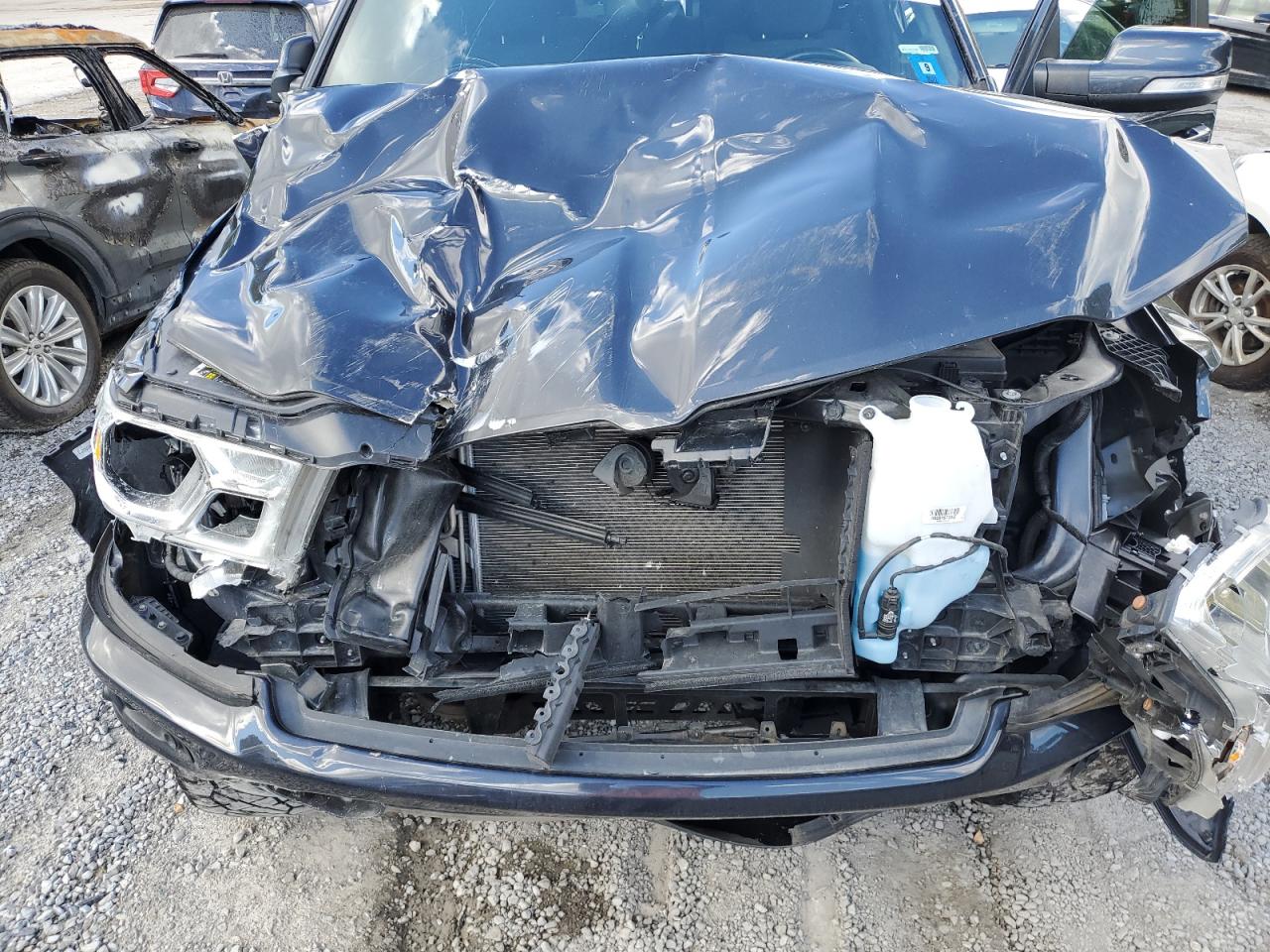 2019 RAM 1500 VIN 1C6SRFFTXKN885968 Copart auction photo, front end / side damage thumbnail 11