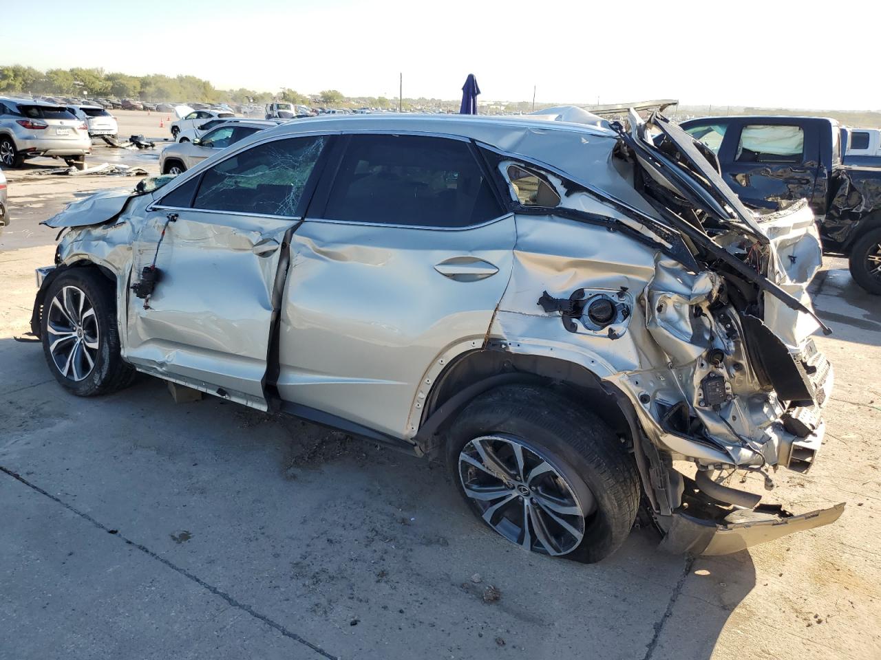 2021 Lexus RX VIN 2T2HZMAA7MC208634 Copart auction photo, rollover damage thumbnail 2