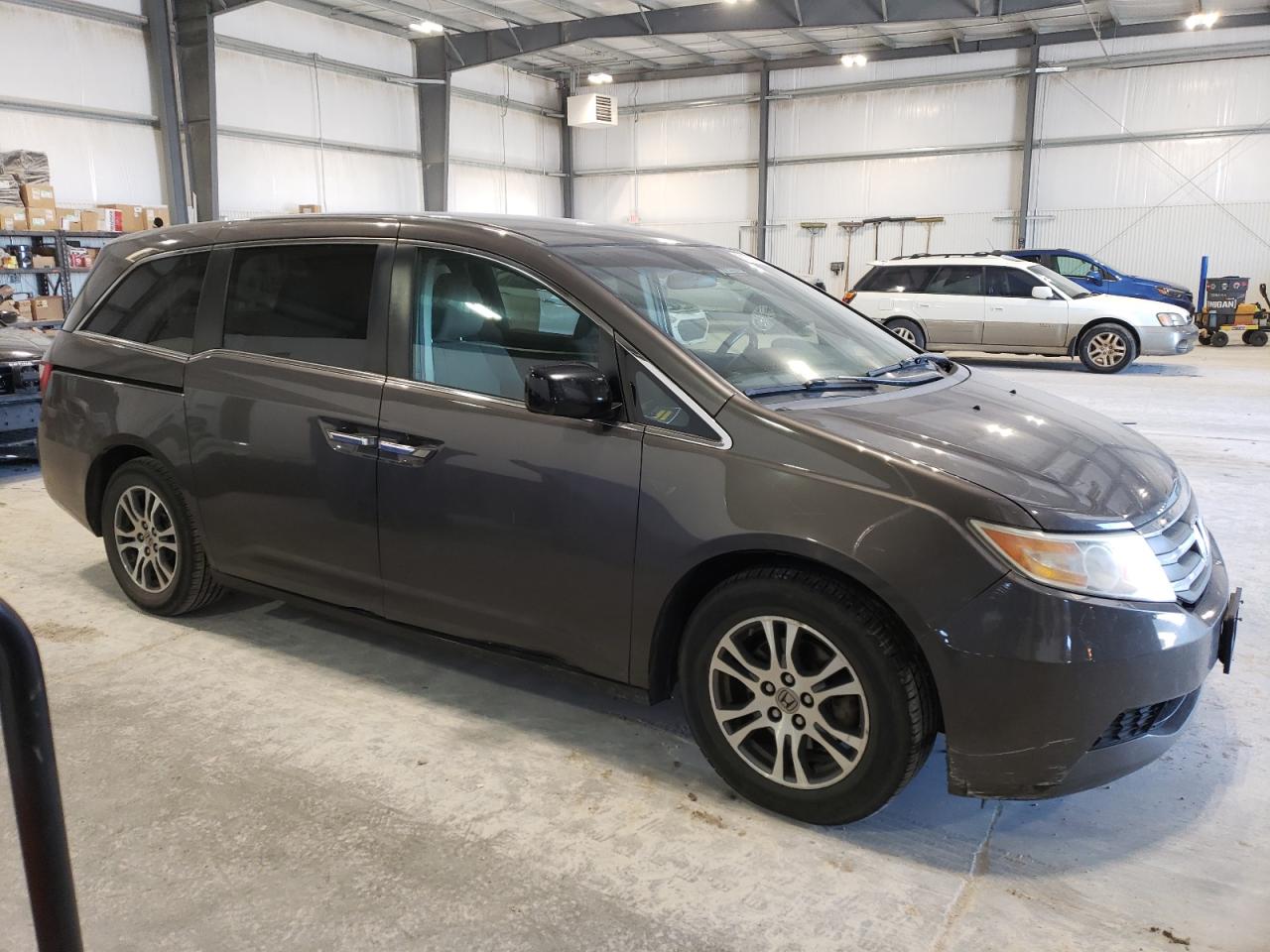 2012 Honda Odyssey VIN 5FNRL5H49CB143960 Copart auction photo, hail / rear end damage thumbnail 4