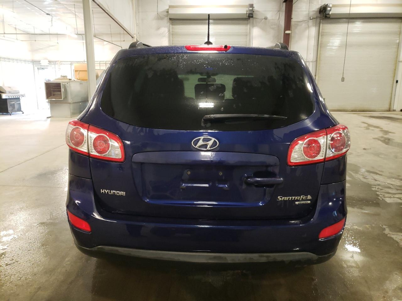 2010 Hyundai Santa Fe VIN 5NMSGDAB7AH404779 Copart auction photo, front end damage thumbnail 6