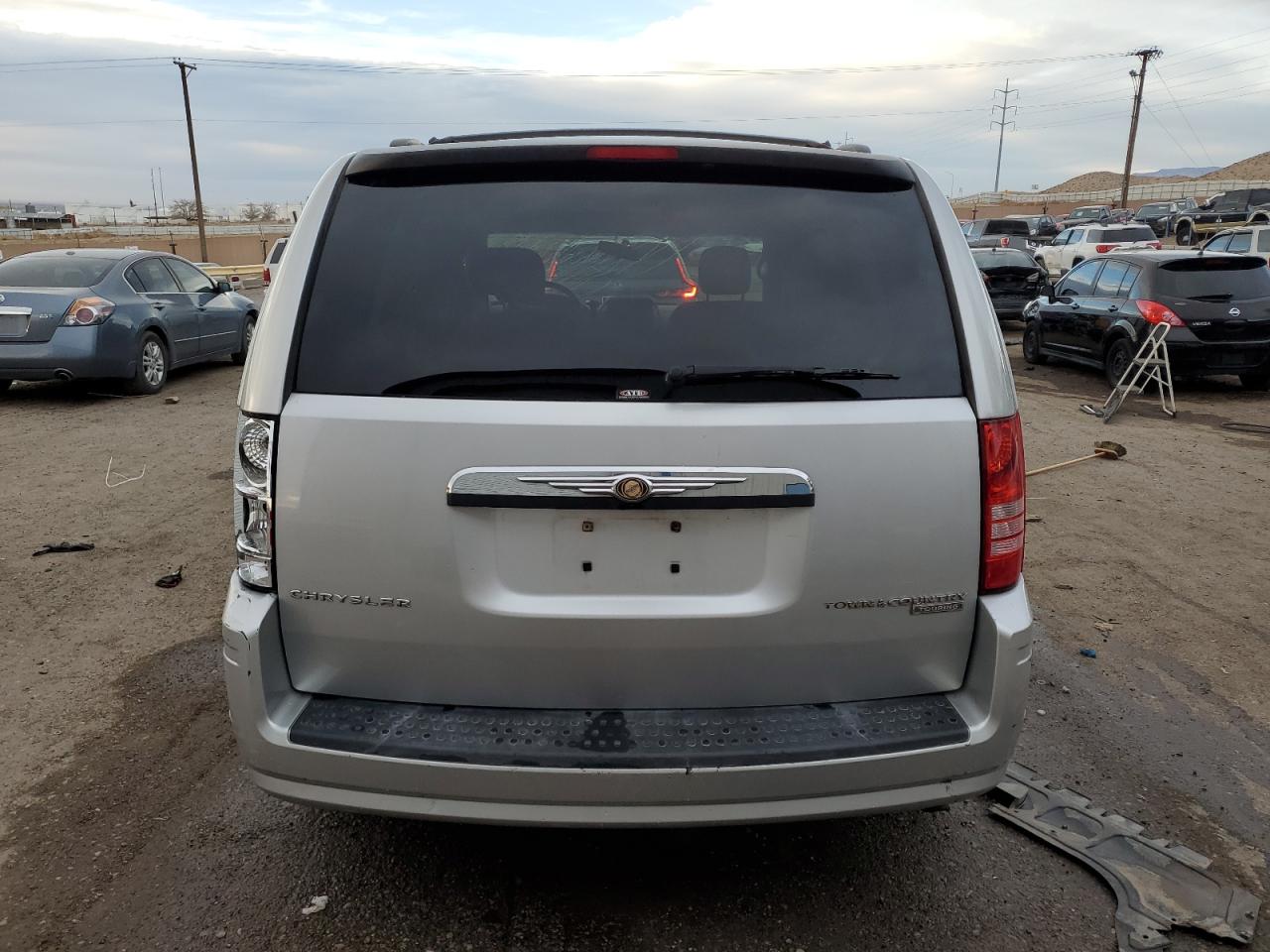 2010 Chrysler Town & Country VIN 2A4RR5D12AR228967 Copart auction photo, front end / side damage thumbnail 6