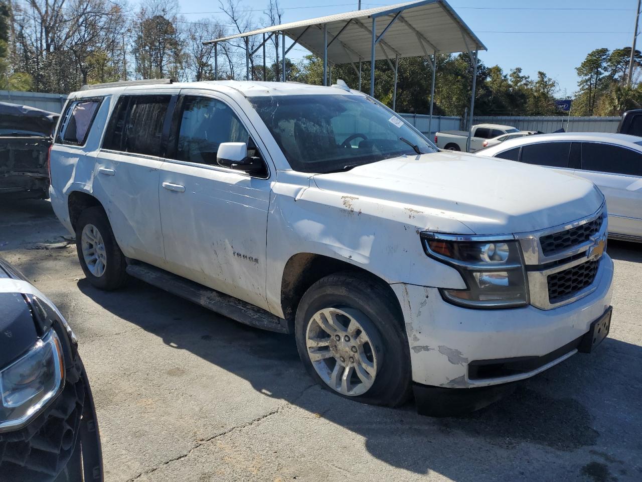 2019 Chevrolet Tahoe VIN 1GNSKAKC7KR176145 Copart auction photo, rollover damage thumbnail 4