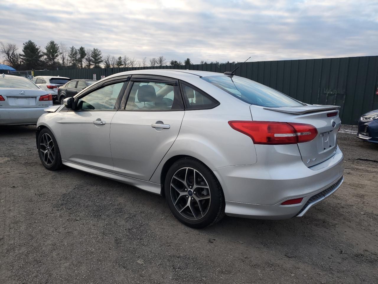 2015 Ford Focus VIN 1FADP3F21FL239951 Copart auction photo, front end / minor dent/scratches damage thumbnail 2