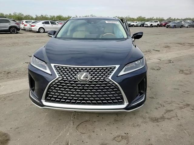 2020 Lexus RX VIN 2T2HZMAA1LC179582 Copart auction photo, side / front end damage thumbnail 11
