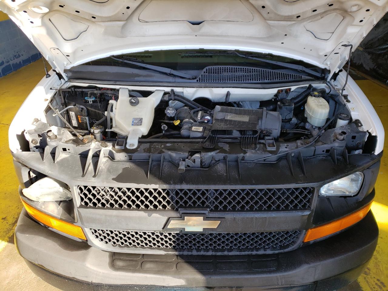 2014 Chevrolet Express VIN 1GCWGFBA9E1100470 Copart auction photo, front end / minor dent/scratches damage thumbnail 12