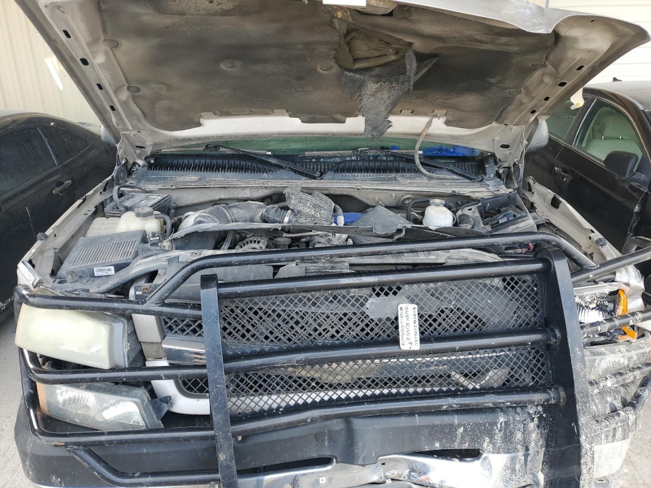 2004 Chevrolet Silverado VIN 1GCHK29104E159856 Copart auction photo, front end / undercarriage damage thumbnail 12