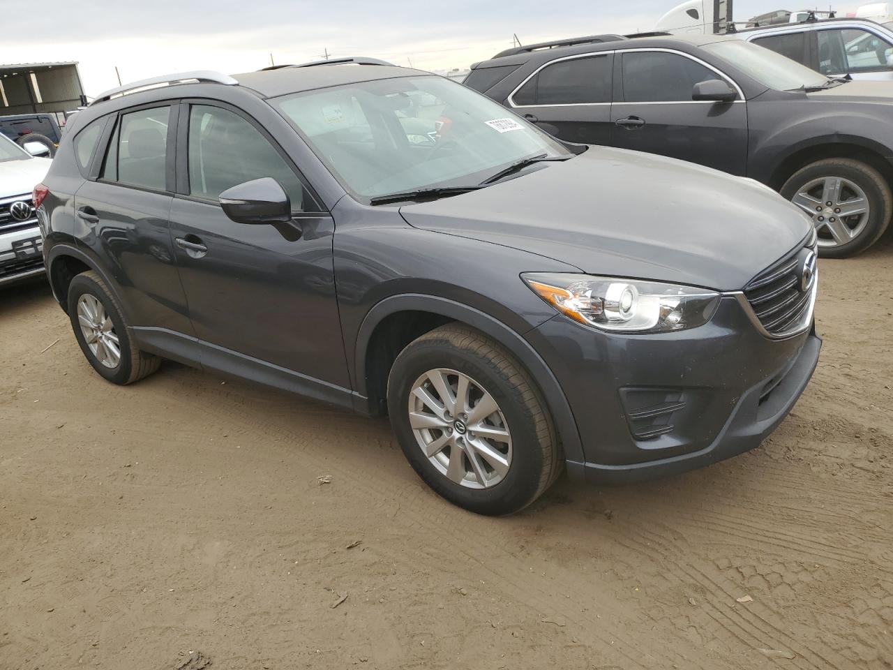 2016 Mazda CX-5 VIN JM3KE4BY6G0882393 Copart auction photo, hail damage thumbnail 4