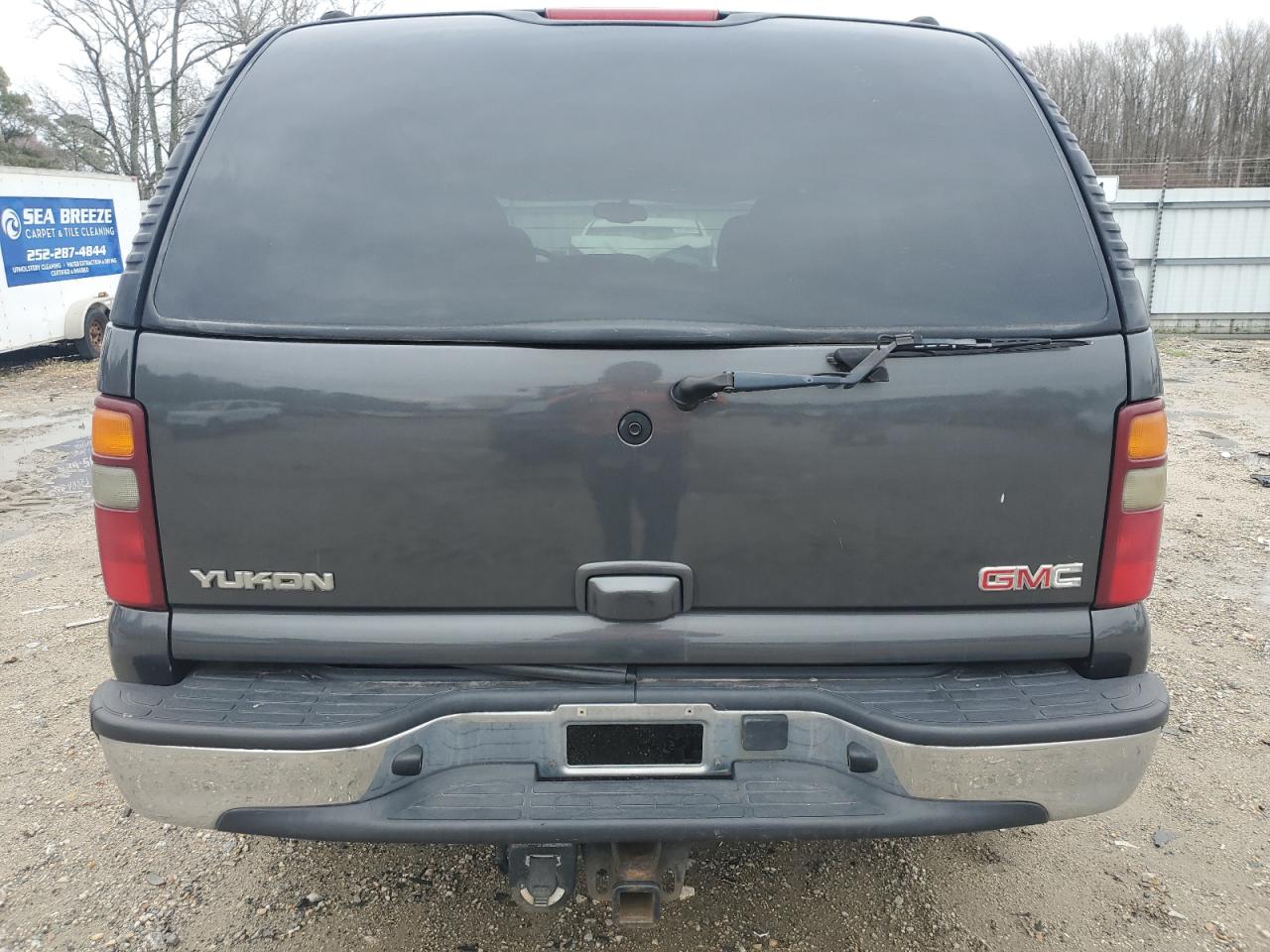 2003 GMC Yukon VIN 1GKEK13ZX3J309185 Copart auction photo, front end / minor dent/scratches damage thumbnail 6