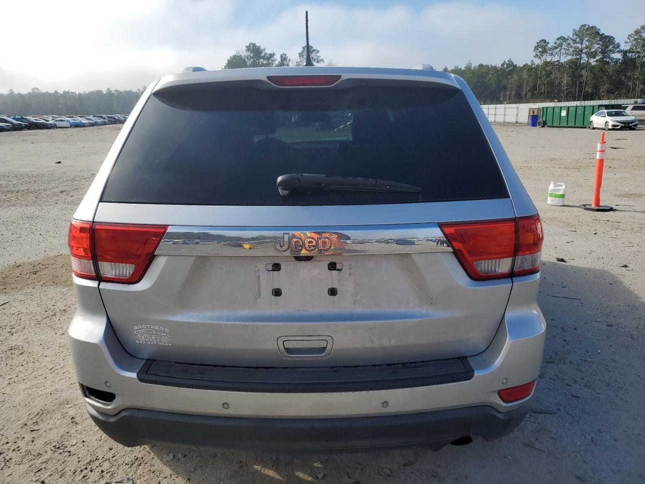 2011 Jeep Grand Cherokee VIN 1J4RS4GG3BC646804 Copart auction photo, front end / side damage thumbnail 6
