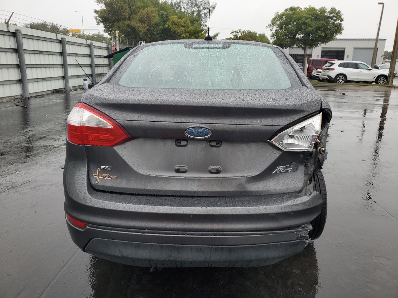 2015 Ford Fiesta VIN 3FADP4BJXFM178584 Copart auction photo, rear end / front end damage thumbnail 6