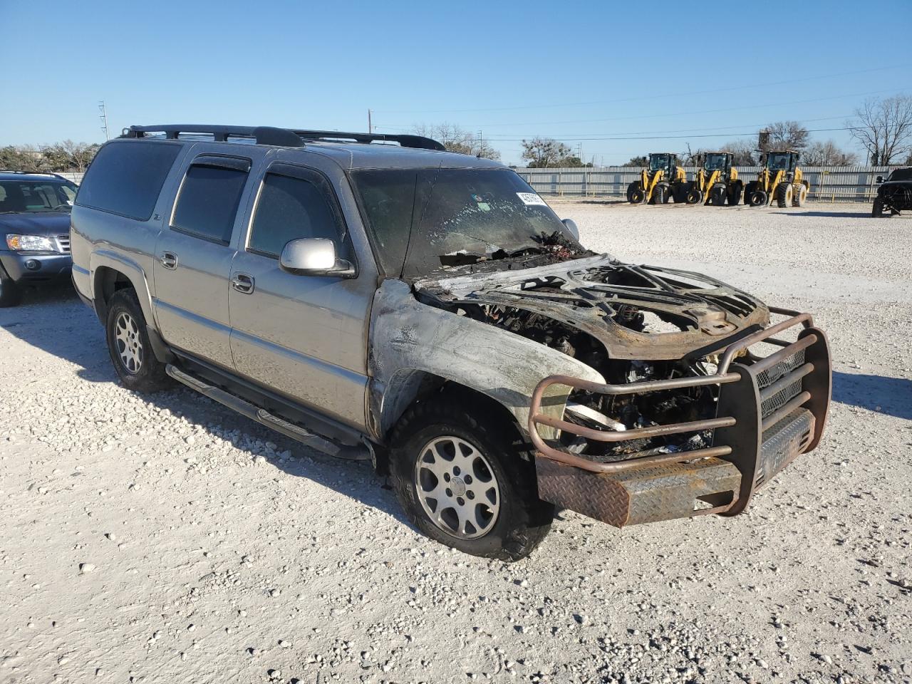 2002 Chevrolet Suburban VIN 3GNFK16Z22G245579 Copart auction photo, burn damage thumbnail 4