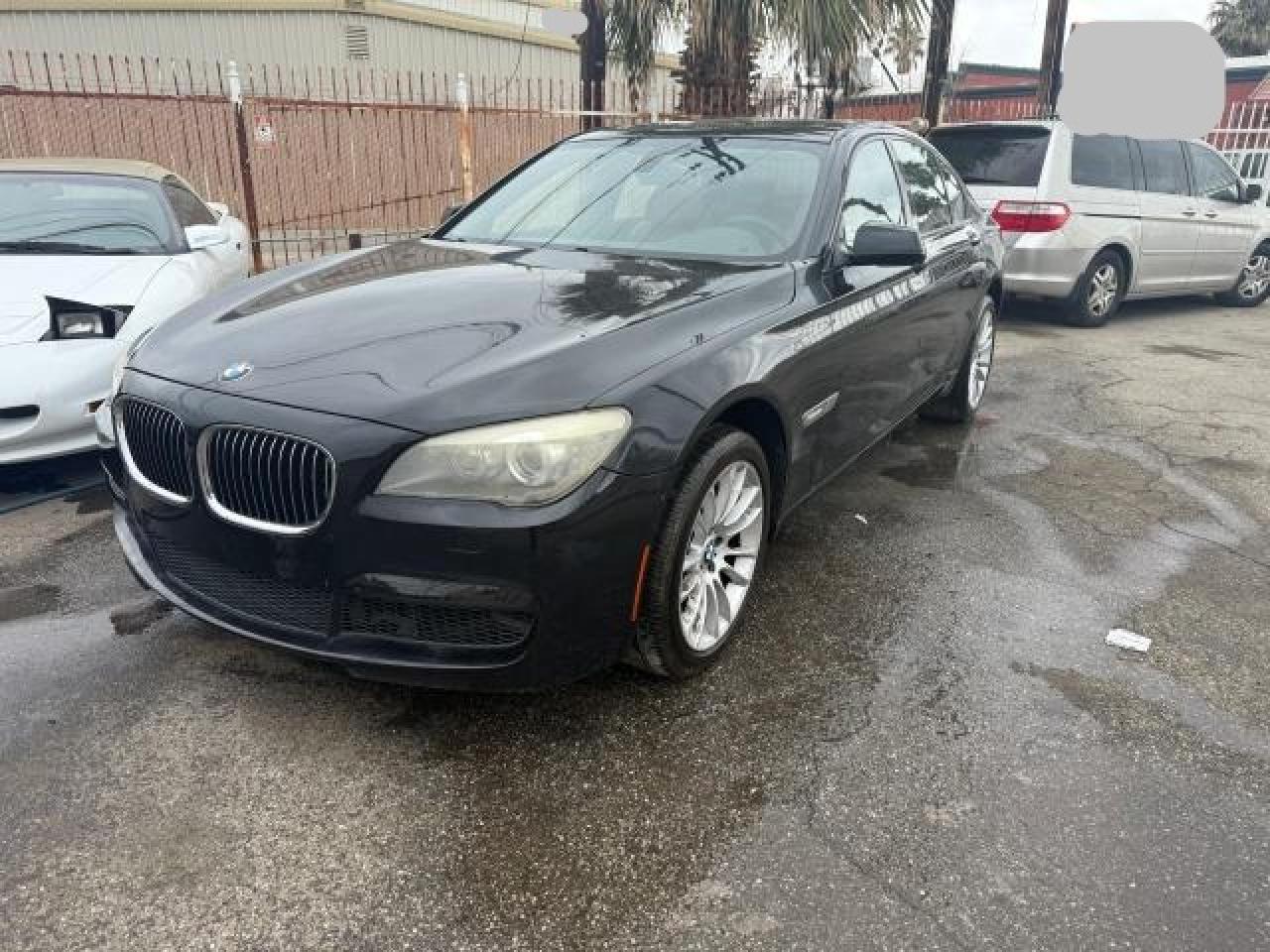 2012 BMW 7er VIN WBAKA8C5XCDX01120 Copart auction photo, normal wear / minor dent/scratches damage thumbnail 2