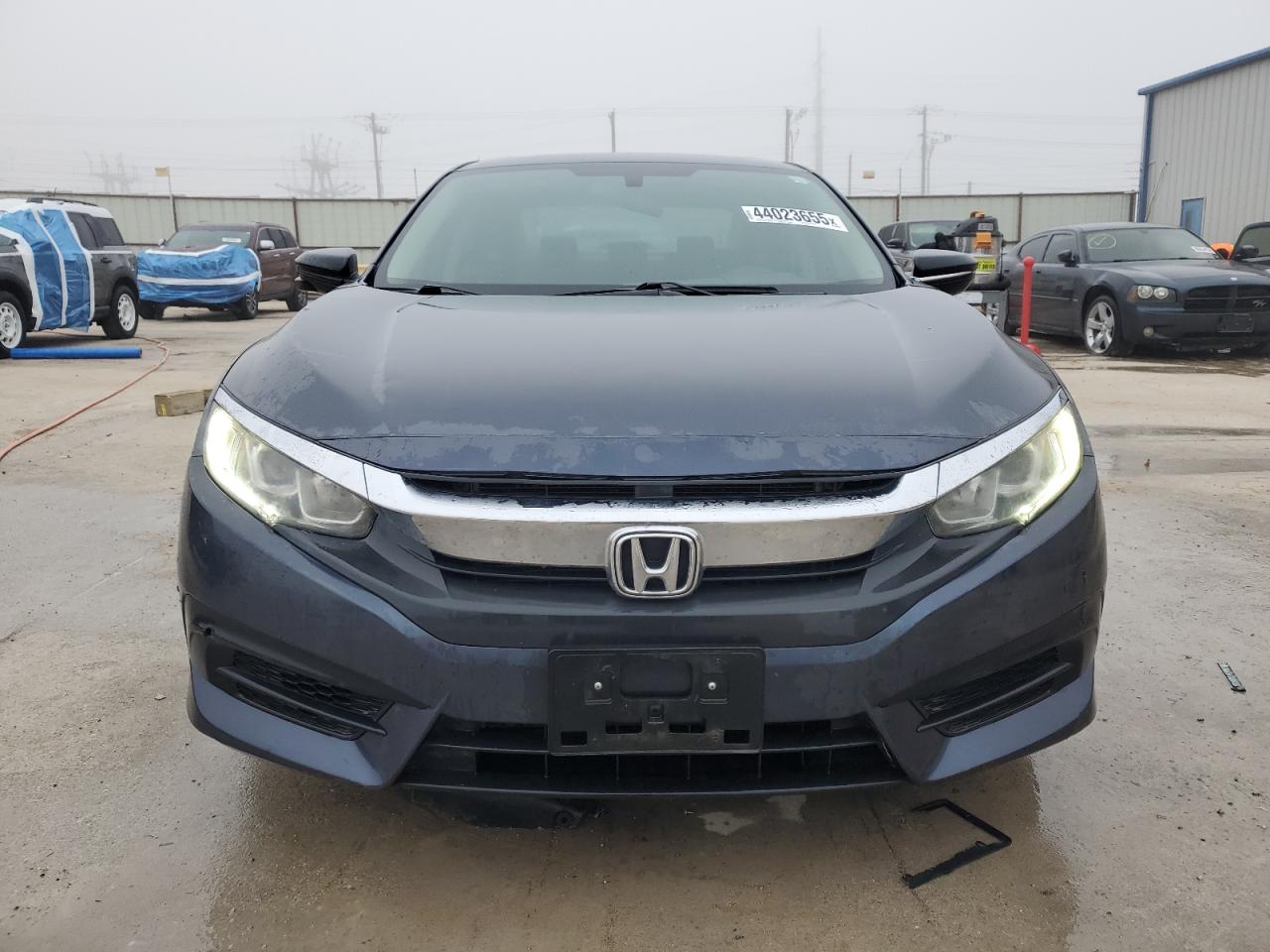 2018 Honda Civic VIN 19XFC2F71JE025452 Copart auction photo, front end damage thumbnail 5