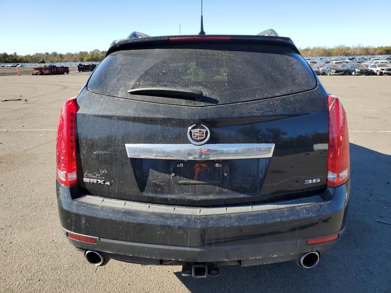 2014 Cadillac SRX VIN 3GYFNEE30ES609594 Copart auction photo, front end / minor dent/scratches damage thumbnail 6