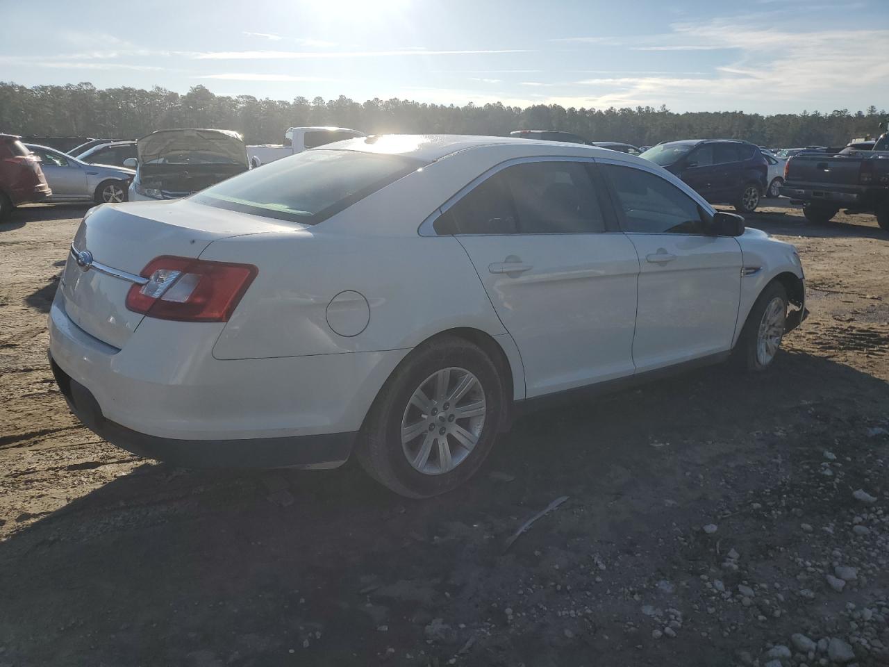 2010 Ford Taurus VIN 1FAHP2DW3AG153902 Copart auction photo, front end / side damage thumbnail 3
