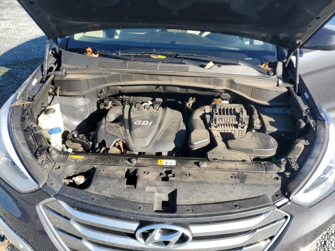 2016 Hyundai Santa Fe VIN 5XYZU3LB6GG339683 Copart auction photo, front end / side damage thumbnail 12