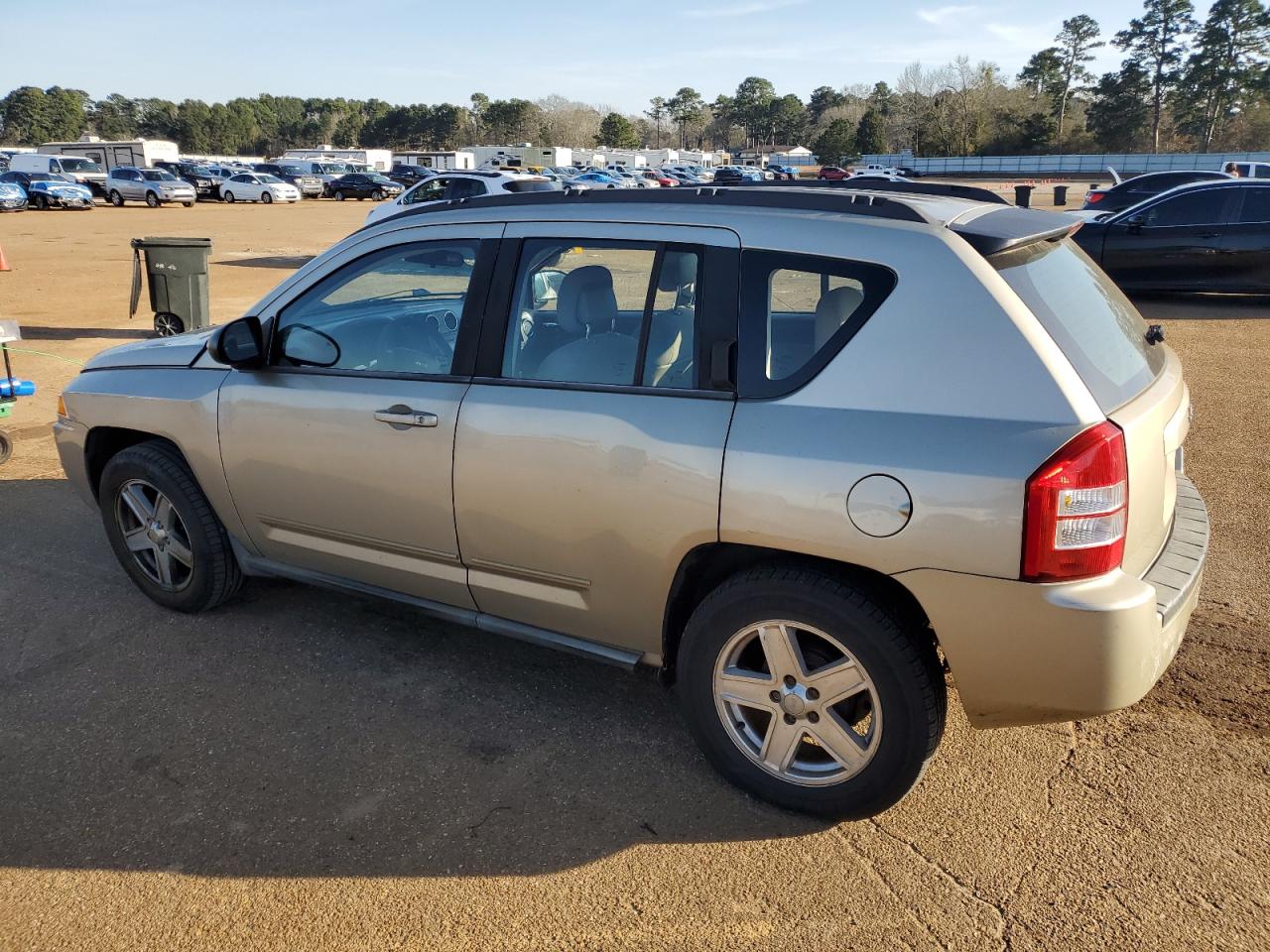2010 Jeep Compass VIN 1J4NT4FB5AD570092 Copart auction photo, rear end / minor dent/scratches damage thumbnail 2