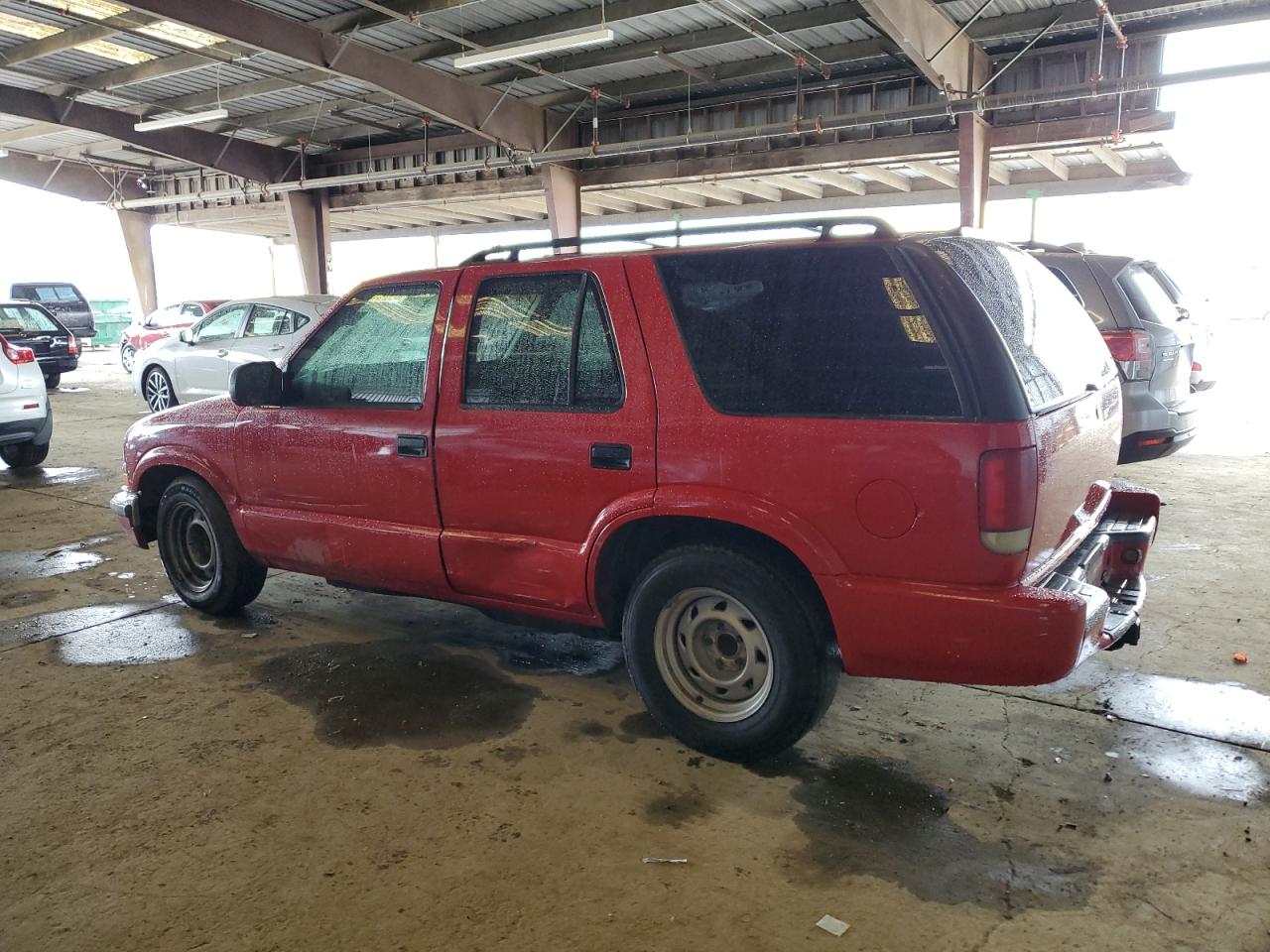 2001 Chevrolet Blazer VIN 1GNCS13W71K106813 Copart auction photo, side damage thumbnail 2