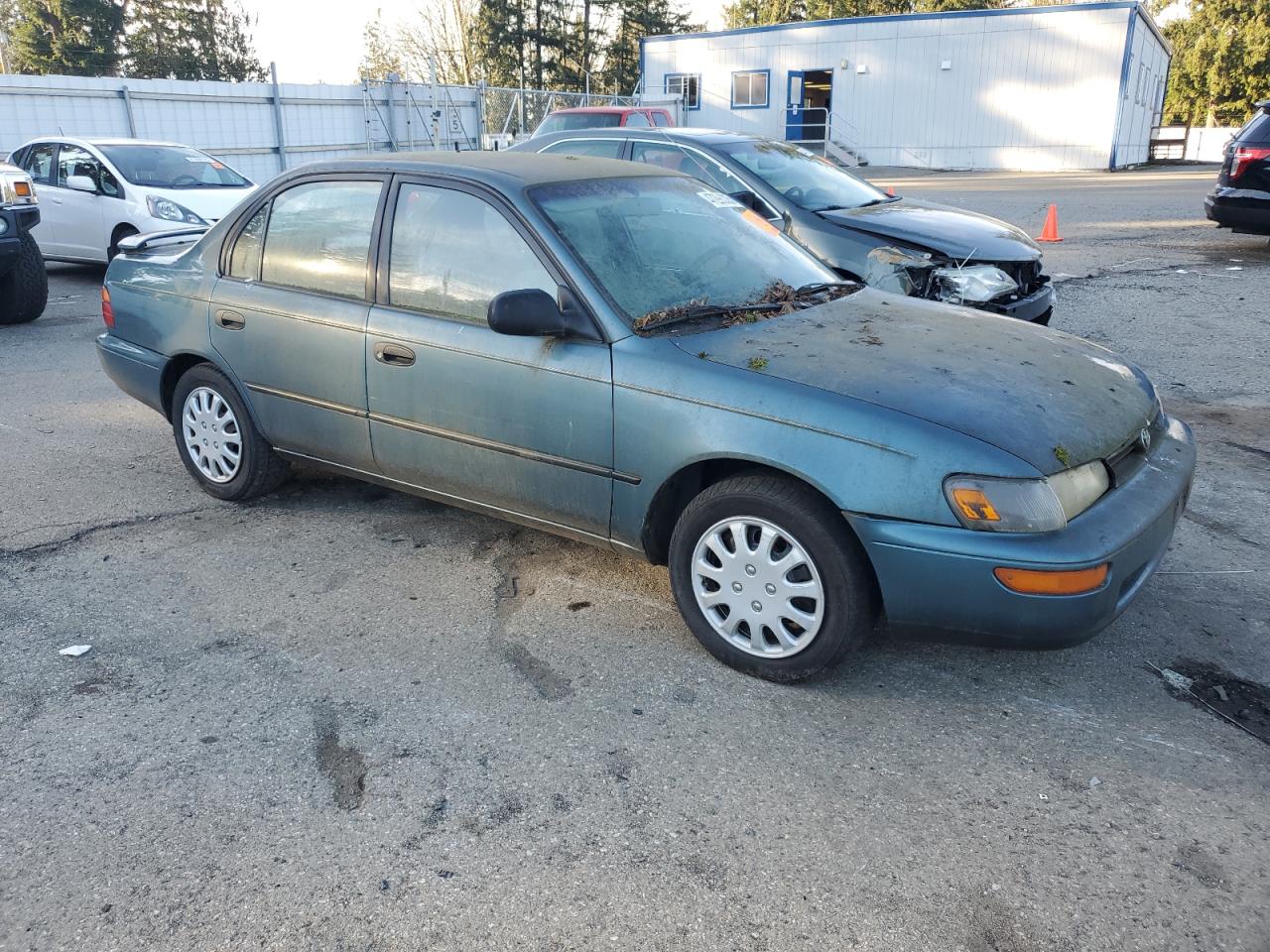 1995 Toyota Corolla VIN 1NXAE09B2SZ329011 Copart auction photo, rear end damage thumbnail 4