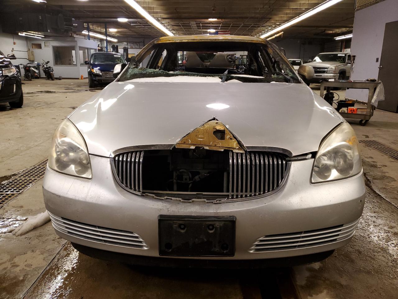 2009 Buick Lucerne VIN 1G4HP57199U107947 Copart auction photo, burn / rear end damage thumbnail 5