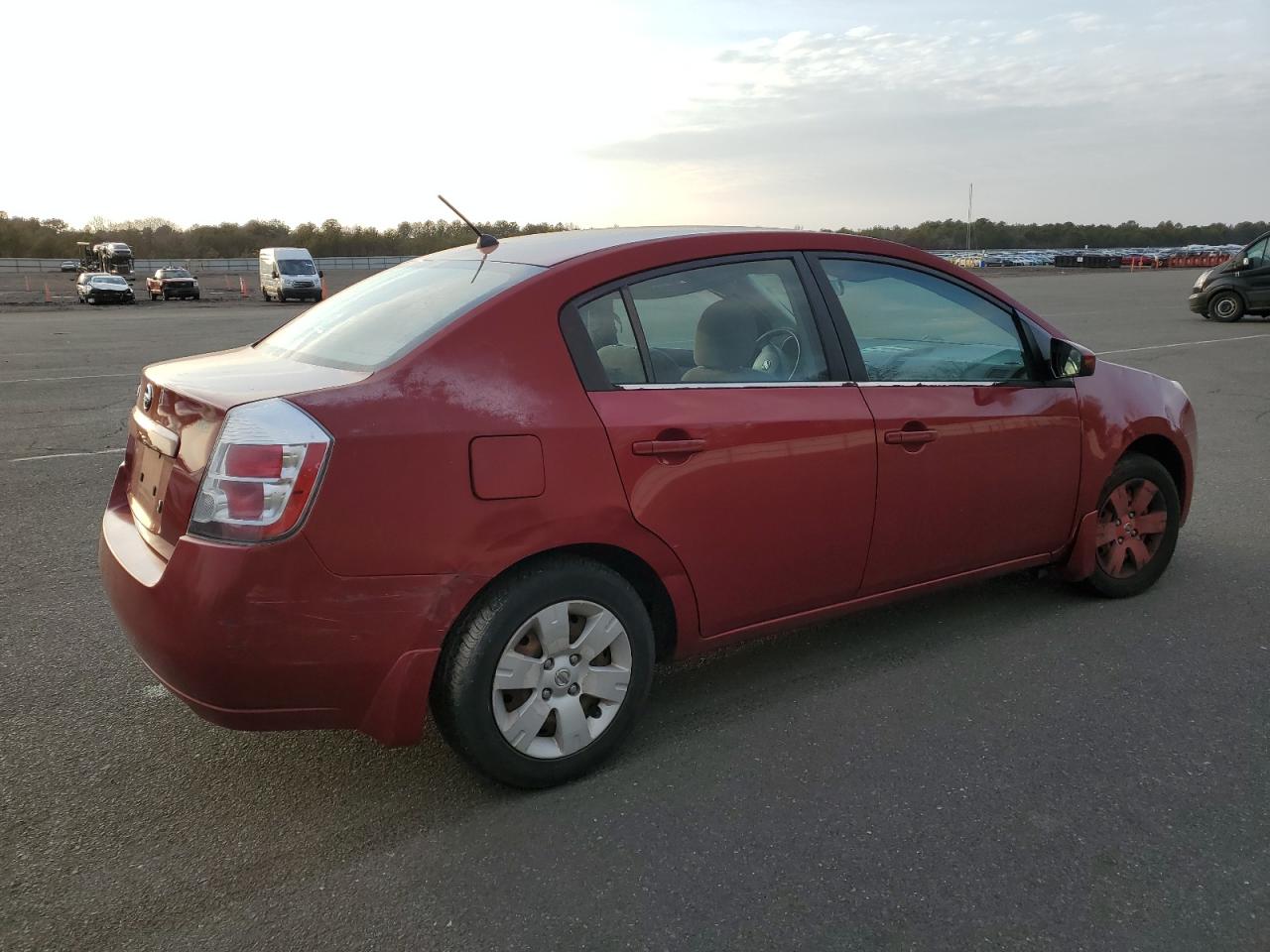 2009 Nissan Sentra VIN 3N1AB61E59L668312 Copart auction photo, side / rear end damage thumbnail 3