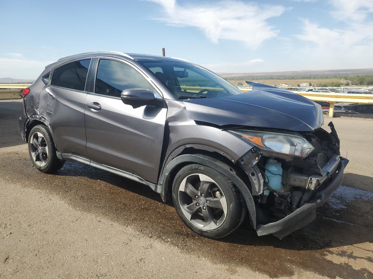 2018 Honda HR-V VIN 3CZRU6H72JM700045 Copart auction photo, front end / side damage thumbnail 4