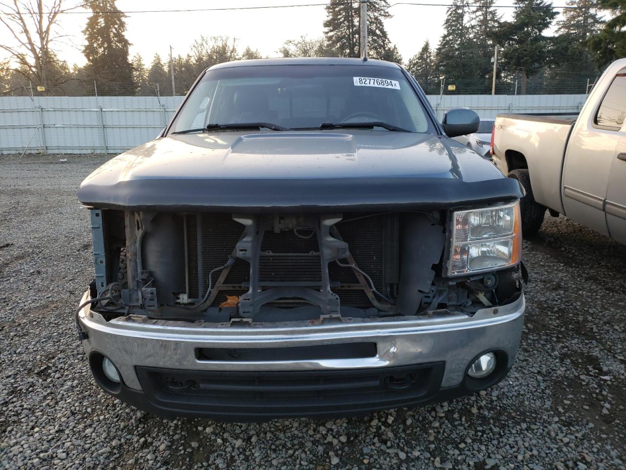 2010 GMC Sierra VIN 3GTRKWE23AG219711 Copart auction photo, front end / side damage thumbnail 5