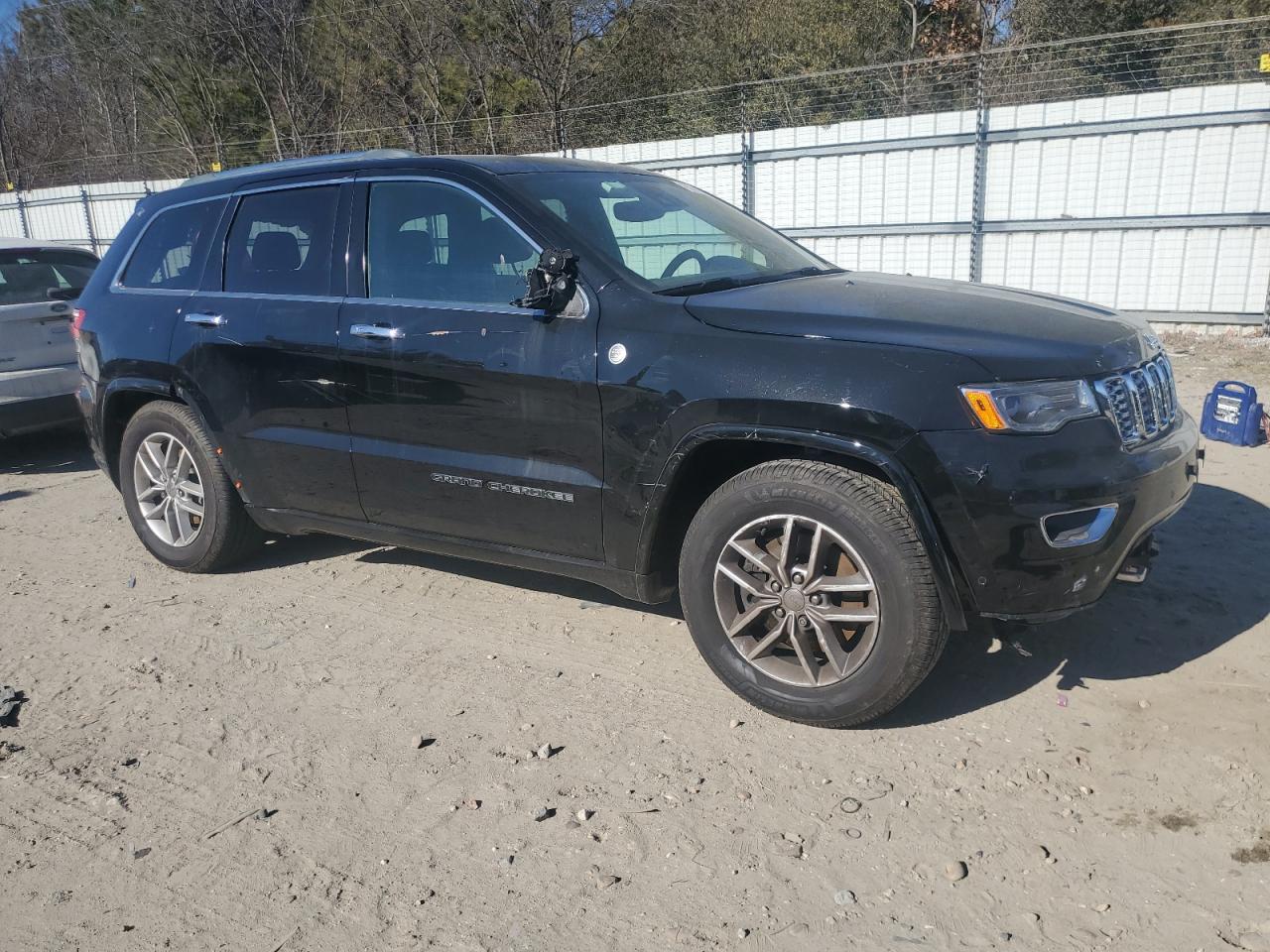 2018 Jeep Grand Cherokee VIN 1C4RJFCT8JC139001 Copart auction photo, rear end / side damage thumbnail 4