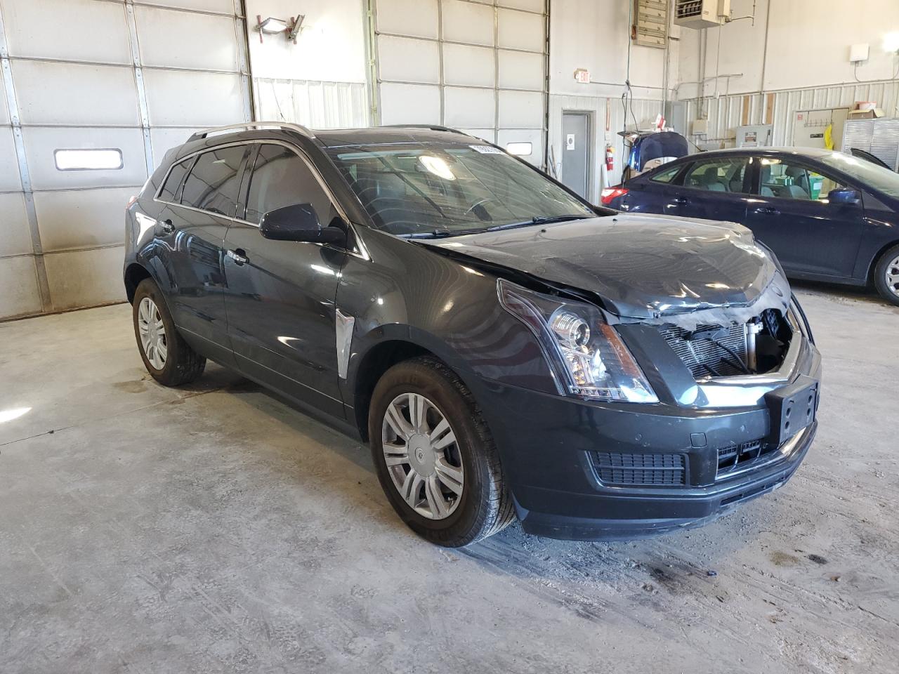 2014 Cadillac SRX VIN 3GYFNEE39ES611473 Copart auction photo, front end / side damage thumbnail 4