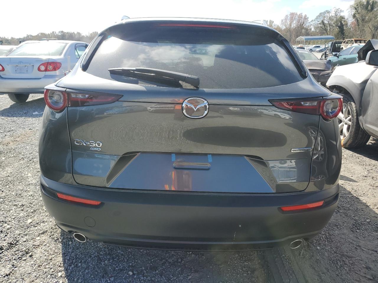 2024 Mazda CX-30 VIN 3MVDMBCM1RM687840 Copart auction photo, front end / minor dent/scratches damage thumbnail 6