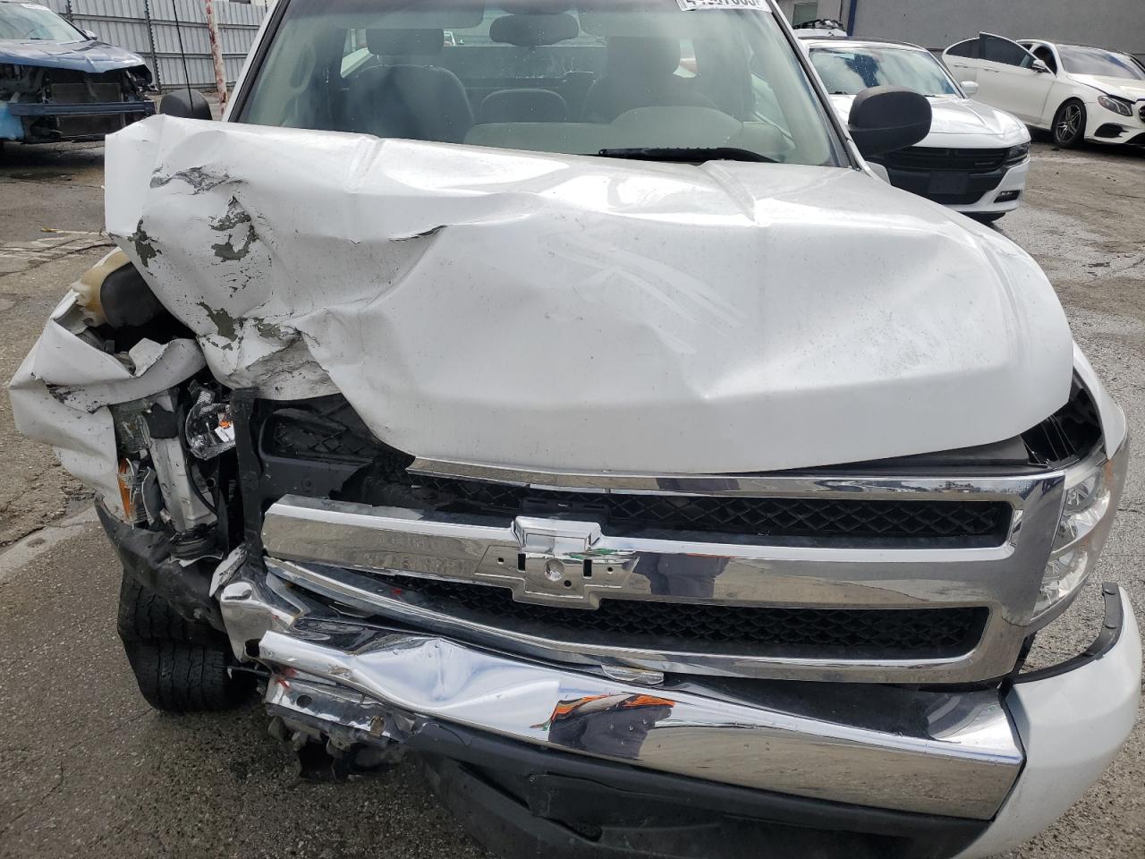 2007 Chevrolet Silverado VIN 1GCEC14C07Z553342 Copart auction photo, front end damage thumbnail 11