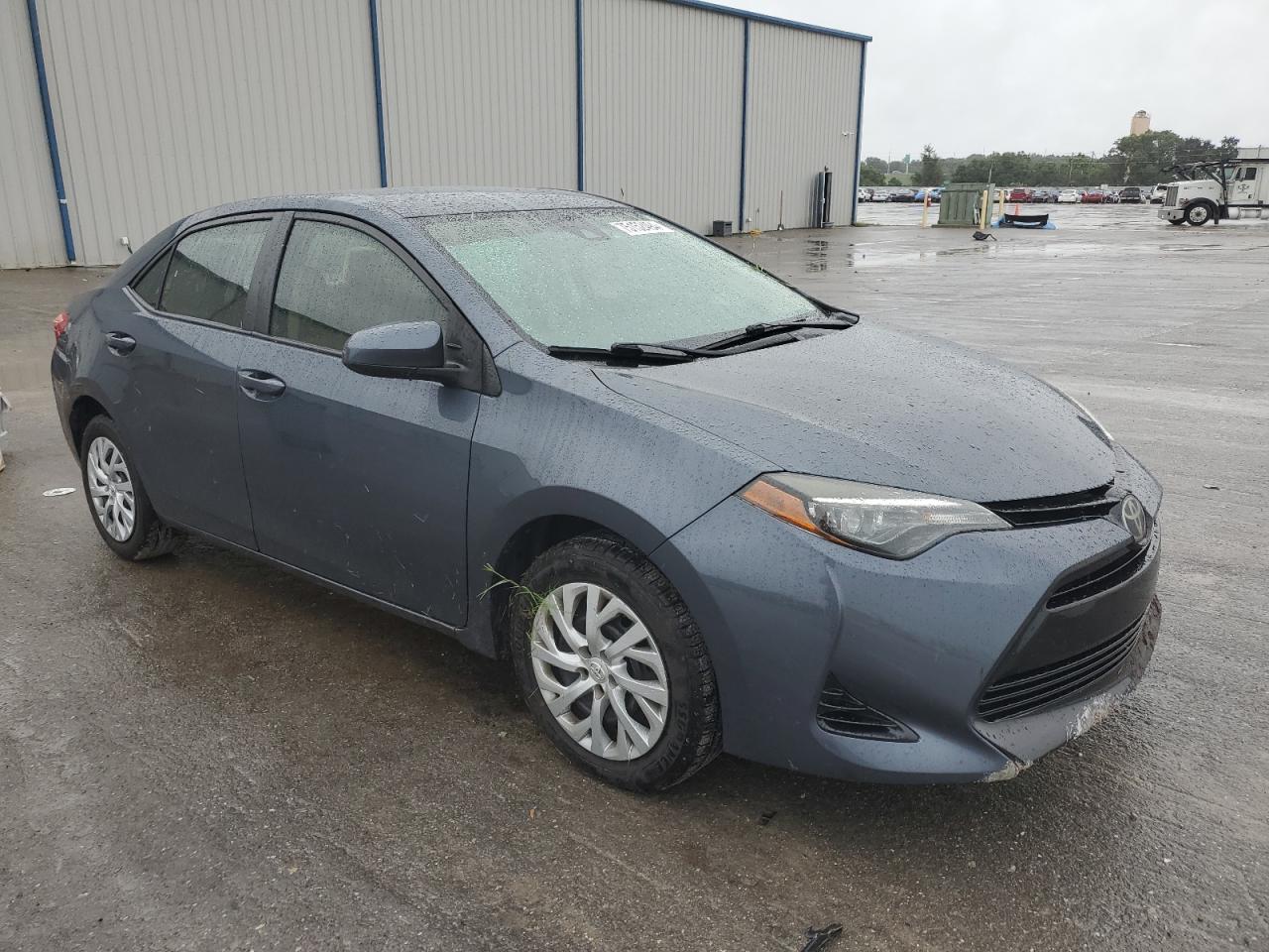 2018 Toyota Corolla VIN 5YFBURHE4JP848374 Copart auction photo, side damage thumbnail 4