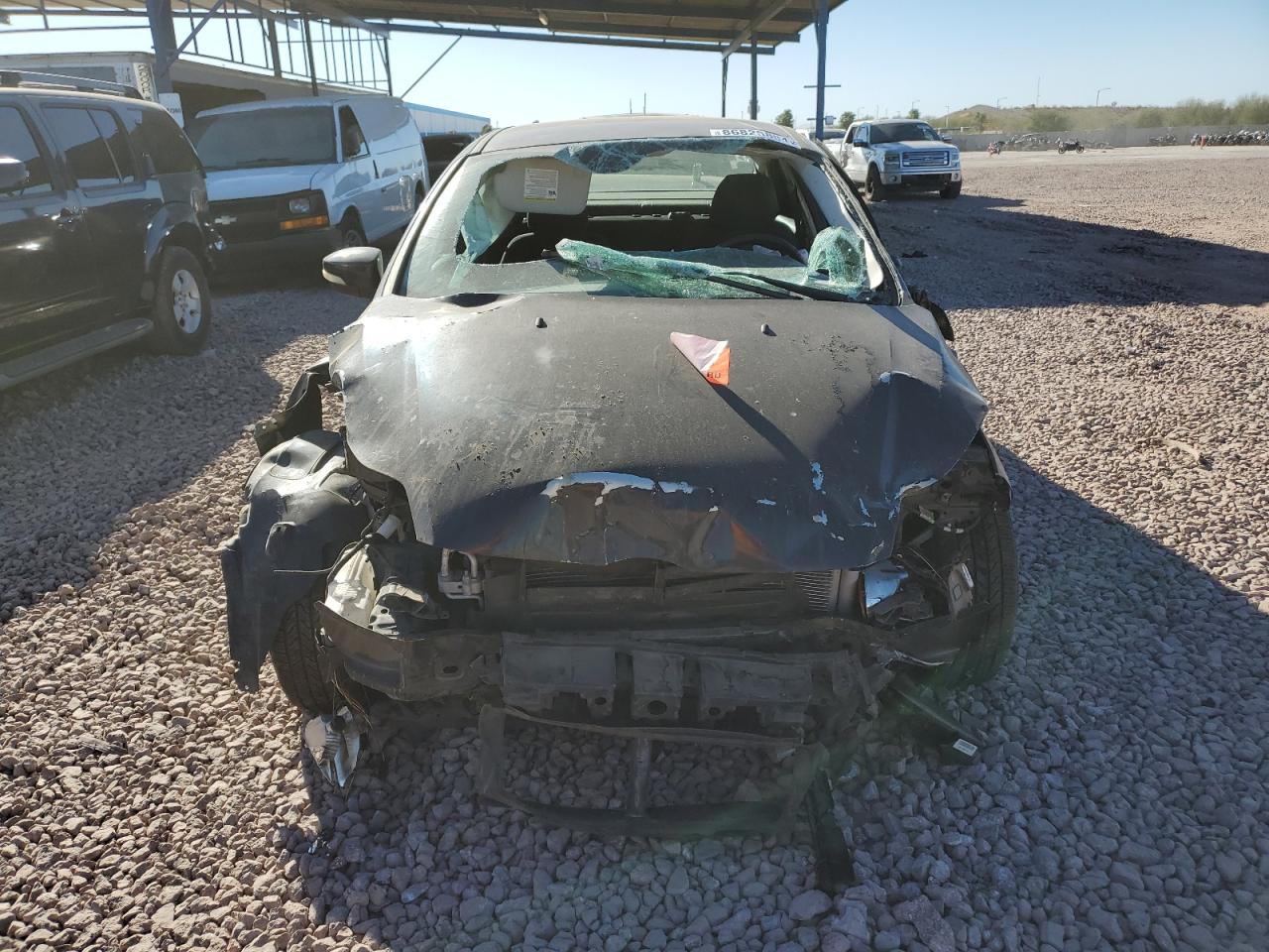 2014 Ford Focus VIN 1FADP3F21EL213994 Copart auction photo, all over damage thumbnail 5